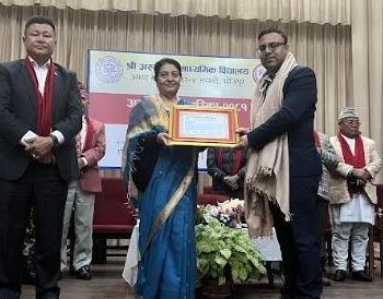 Former President Bhandari honours CEO of Genese Solution for contributions to IT development